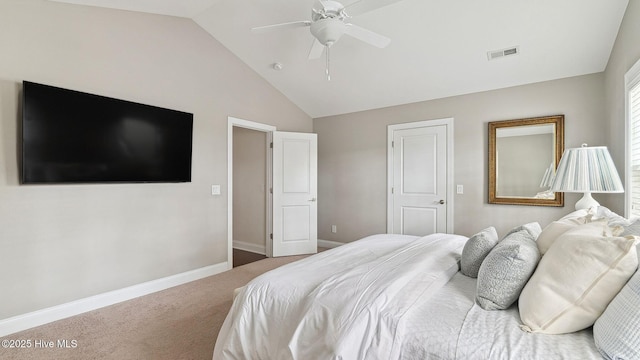 carpeted bedroom featuring vaulted ceiling and ceiling fan