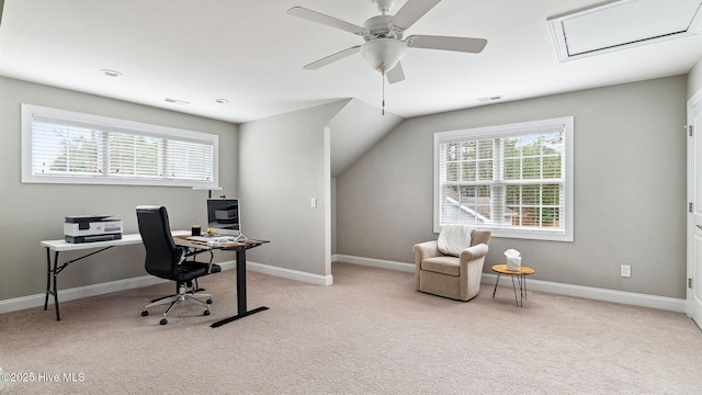 office space with light carpet, a wealth of natural light, and ceiling fan