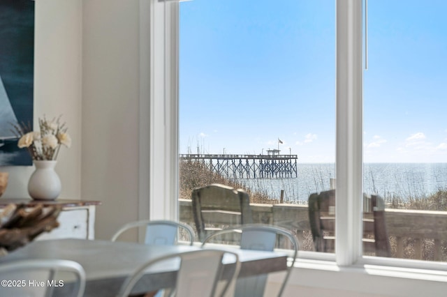 balcony featuring a water view