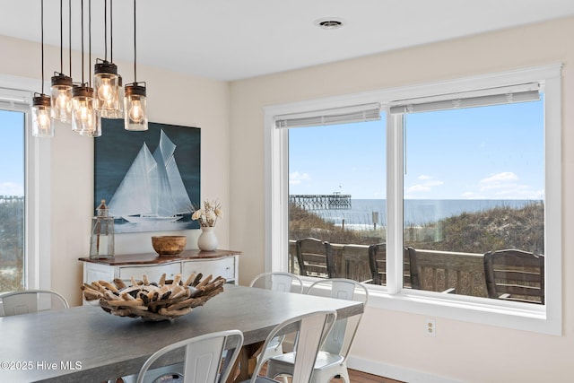 dining room featuring baseboards