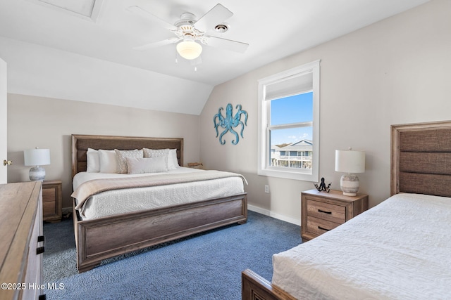 bedroom featuring lofted ceiling, dark colored carpet, ceiling fan, and baseboards