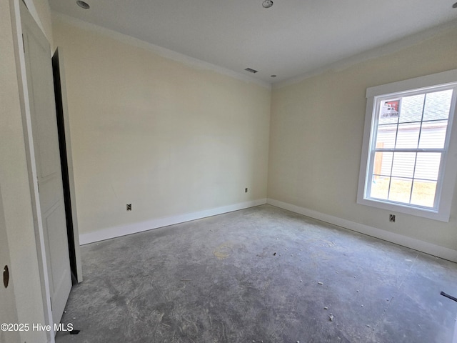 spare room featuring ornamental molding