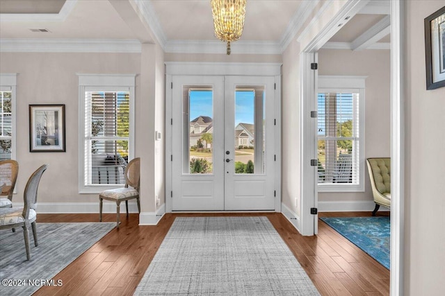 entryway featuring french doors, plenty of natural light, and wood-type flooring