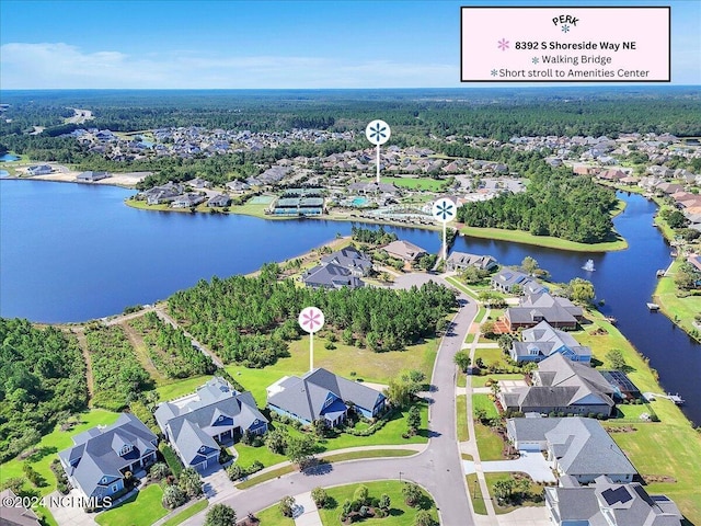 bird's eye view featuring a water view and a residential view