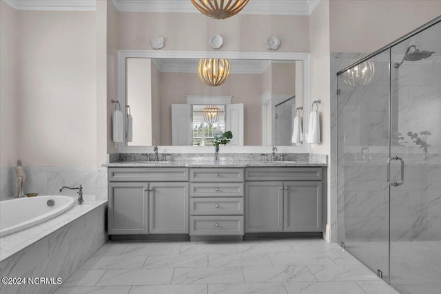 full bathroom with marble finish floor, crown molding, a marble finish shower, double vanity, and a chandelier