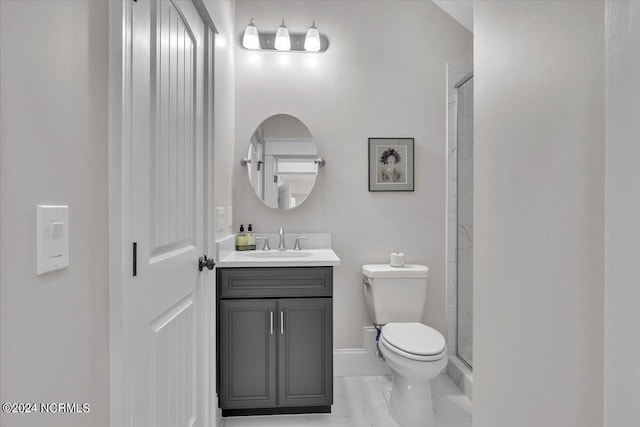 bathroom featuring toilet, vanity, baseboards, marble finish floor, and an enclosed shower