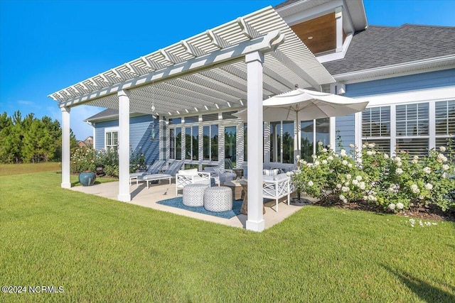 back of house featuring a patio, a shingled roof, a lawn, and a pergola