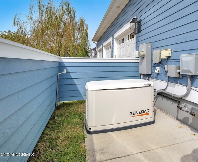 exterior details featuring electric meter and a power unit