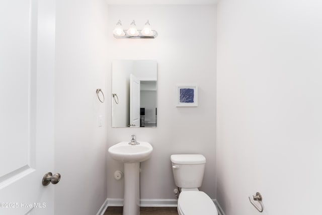 bathroom featuring toilet