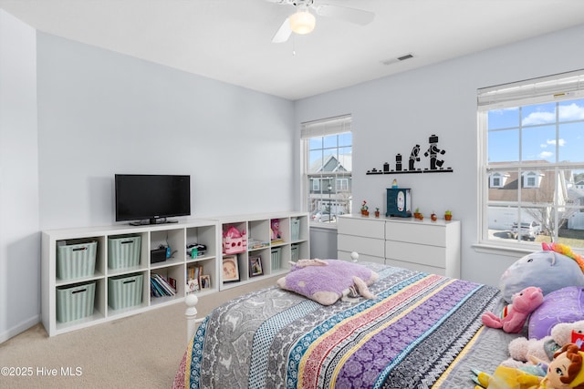 carpeted bedroom featuring ceiling fan