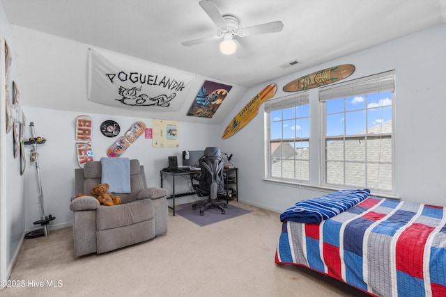 bedroom featuring vaulted ceiling, carpet flooring, and ceiling fan