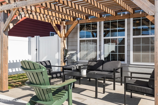 view of patio featuring an outdoor hangout area and a pergola