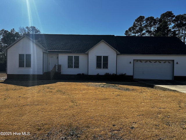 single story home with a garage and a front yard