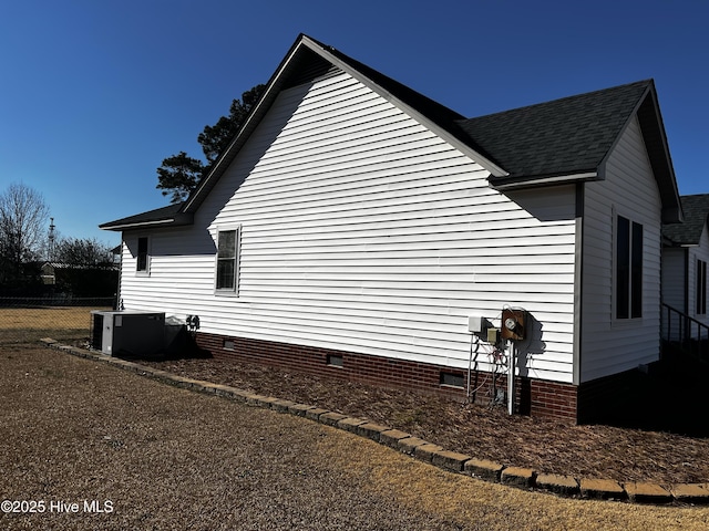 view of property exterior with central AC unit