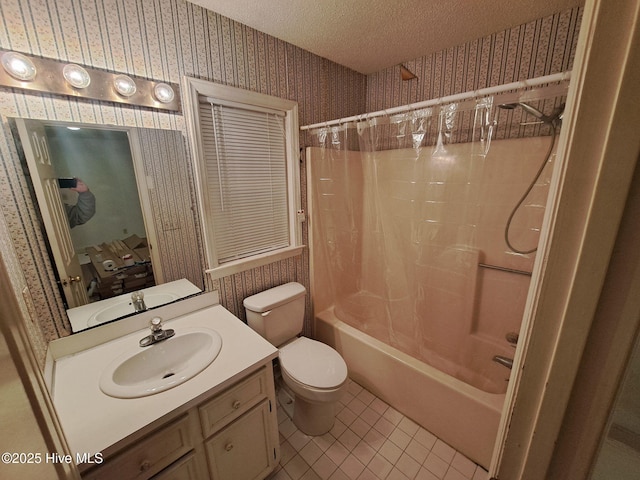 full bathroom with tile patterned flooring, vanity, toilet, a textured ceiling, and shower / bath combo with shower curtain