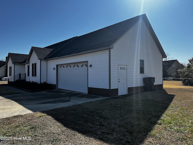 view of property exterior featuring a garage