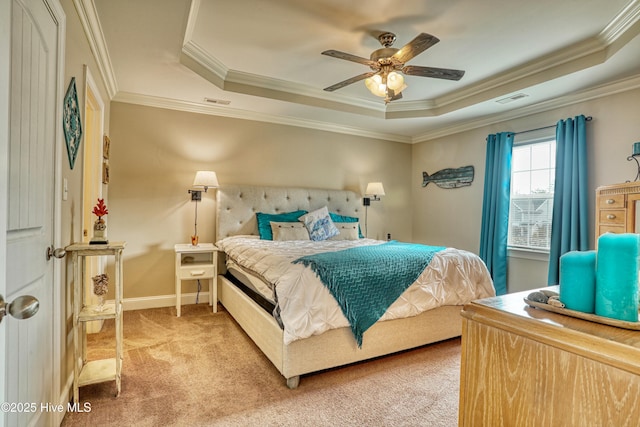 bedroom with crown molding, a raised ceiling, visible vents, light carpet, and baseboards