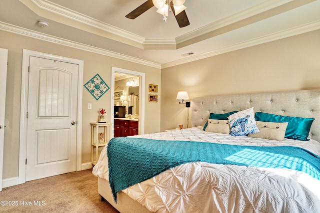 bedroom featuring light carpet, ornamental molding, a raised ceiling, and visible vents