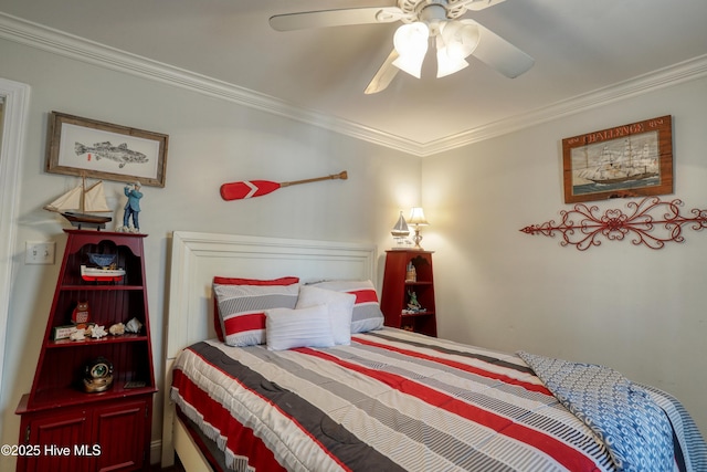 bedroom with ceiling fan and crown molding