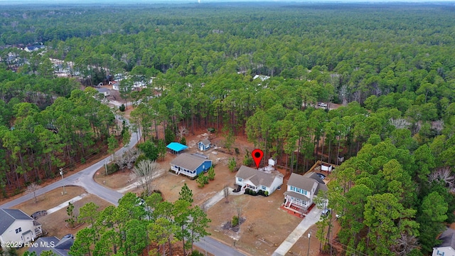 drone / aerial view with a forest view