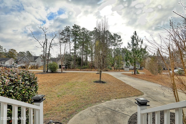 view of yard featuring a residential view