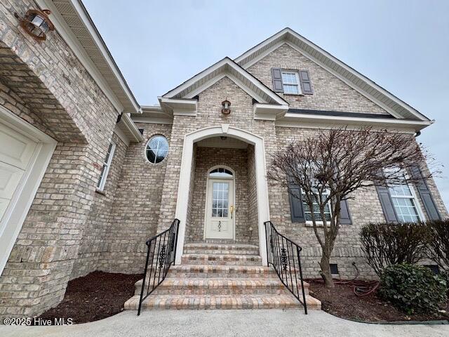 property entrance featuring a garage