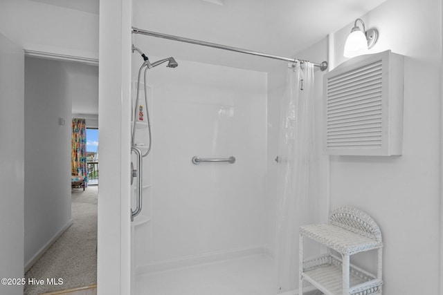 bathroom with a shower with curtain