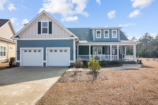 view of front of property with a porch and a garage