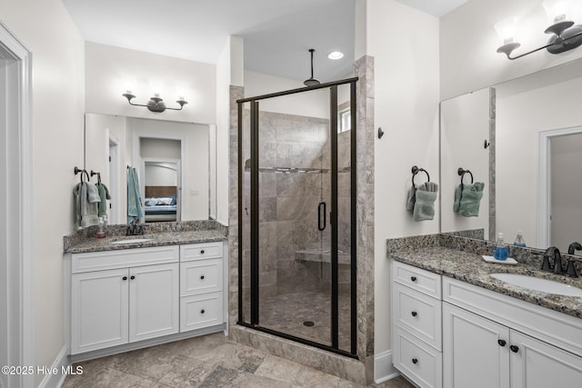 bathroom featuring vanity and walk in shower