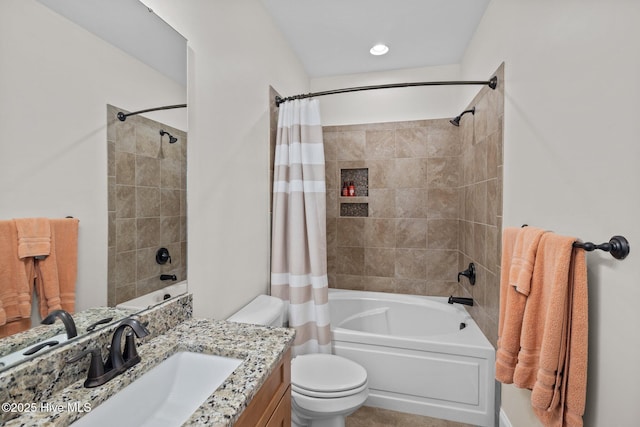 full bathroom with vanity, toilet, and shower / bath combo with shower curtain