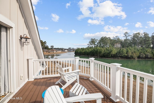 wooden terrace with a water view