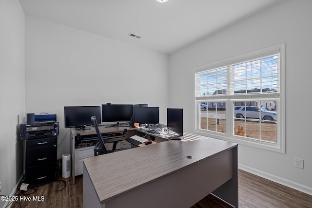 office space featuring dark hardwood / wood-style floors