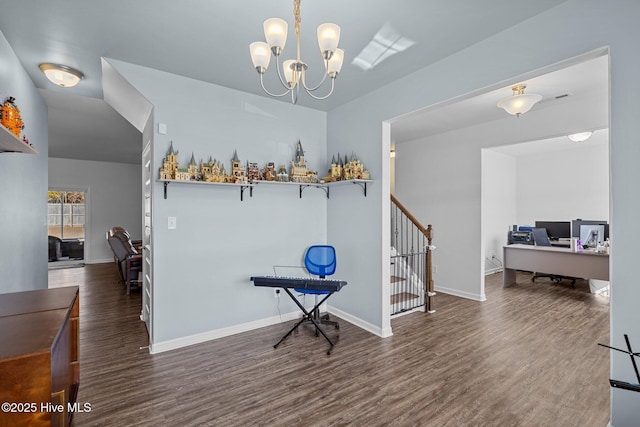 interior space with an inviting chandelier and dark hardwood / wood-style flooring