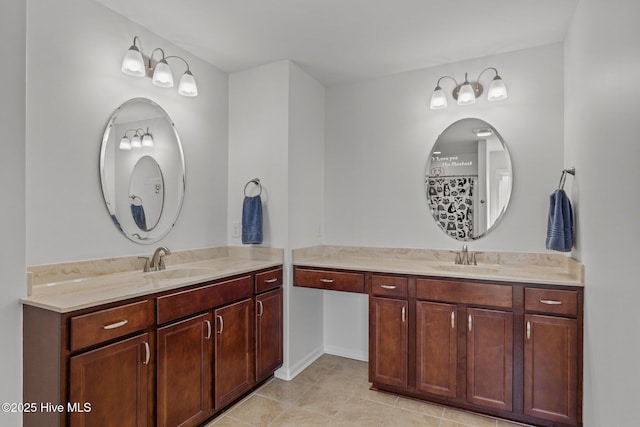 bathroom with vanity and tile patterned flooring