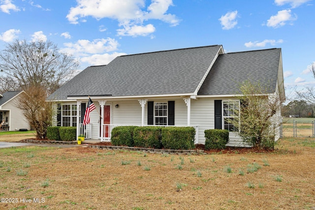 view of front of property with a front lawn