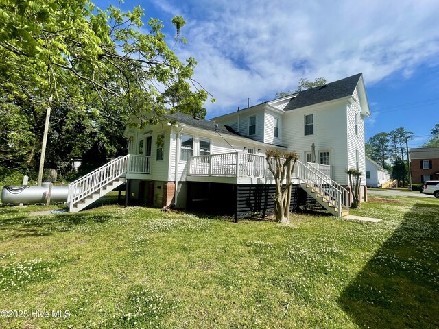 550 E Main St, Belhaven, NC 27810 - rear view of property featuring a deck, stairs, and a yard