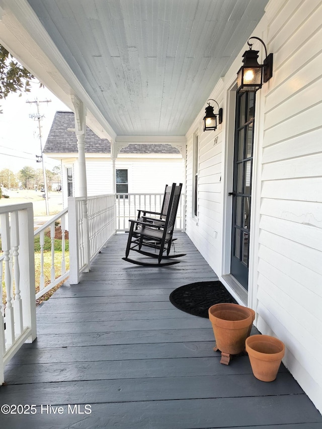 deck featuring covered porch