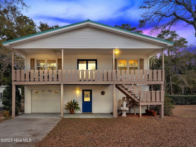 view of front of house featuring a garage and covered porch