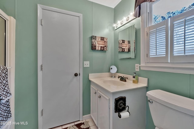 bathroom featuring vanity and toilet