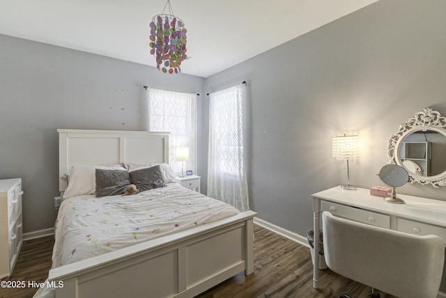 bedroom featuring dark wood-type flooring