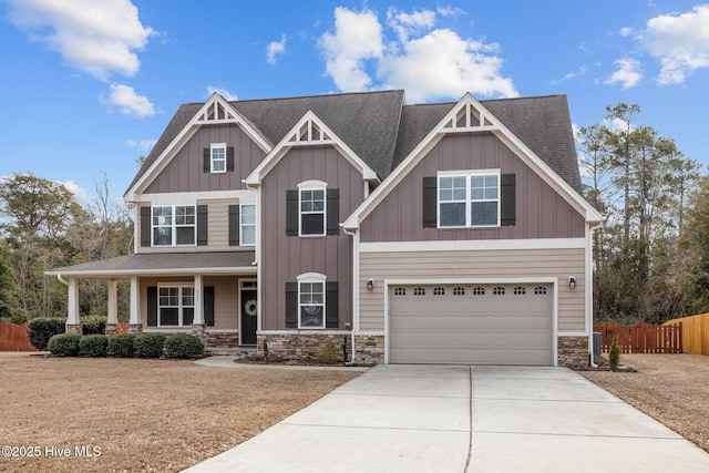 craftsman-style house featuring a garage and a porch