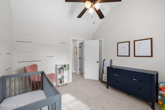 carpeted bedroom with high vaulted ceiling and ceiling fan