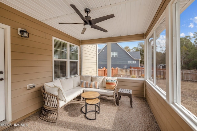 sunroom / solarium with wooden ceiling and ceiling fan