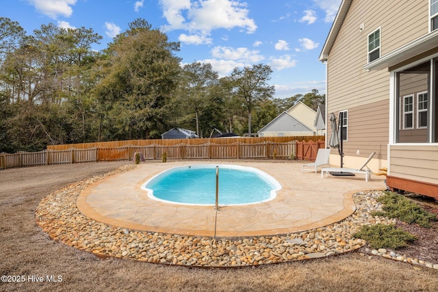 view of pool featuring a patio area