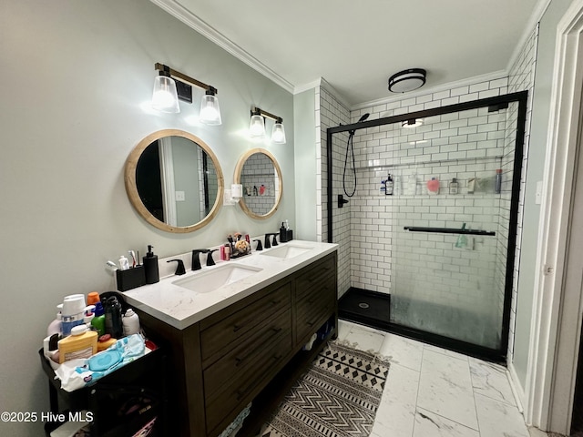 bathroom featuring ornamental molding, vanity, and a shower with shower door