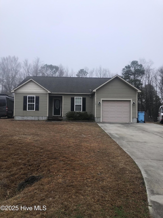 single story home featuring a garage