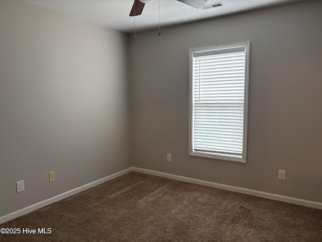 carpeted empty room with ceiling fan