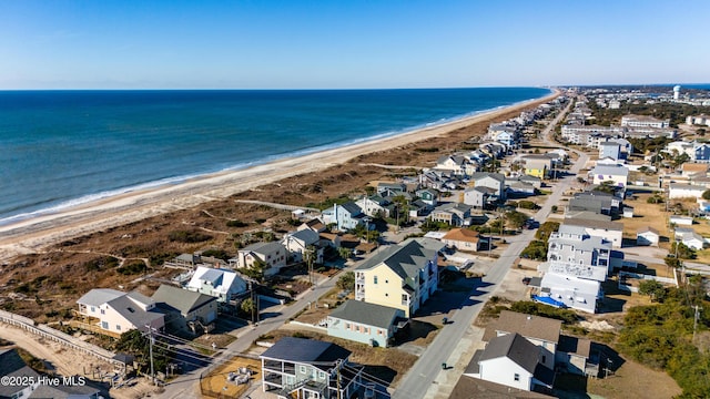 drone / aerial view with a view of the beach and a water view