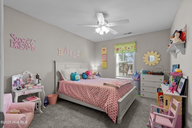 bedroom with ceiling fan and carpet