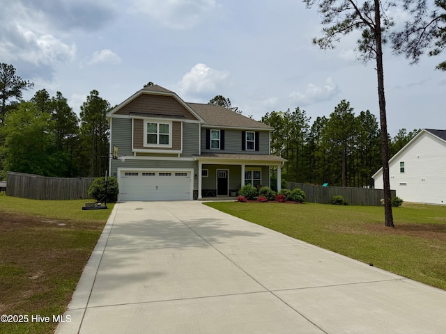 451 Gretchen Rd, West End, NC 27376 - view of front facade featuring concrete driveway, a front lawn, fence, a porch, and a garage